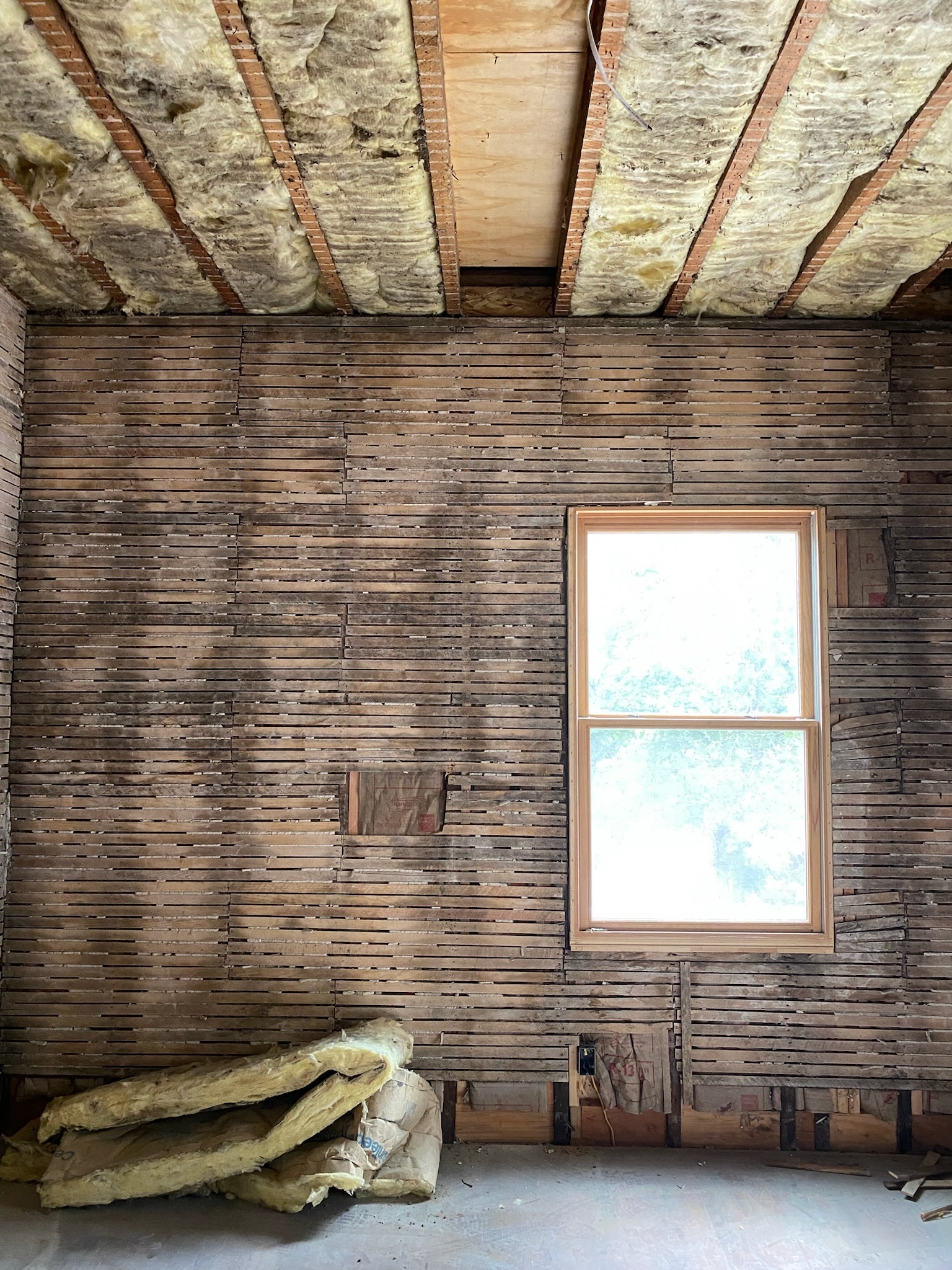 Hand-split lath behind the plaster